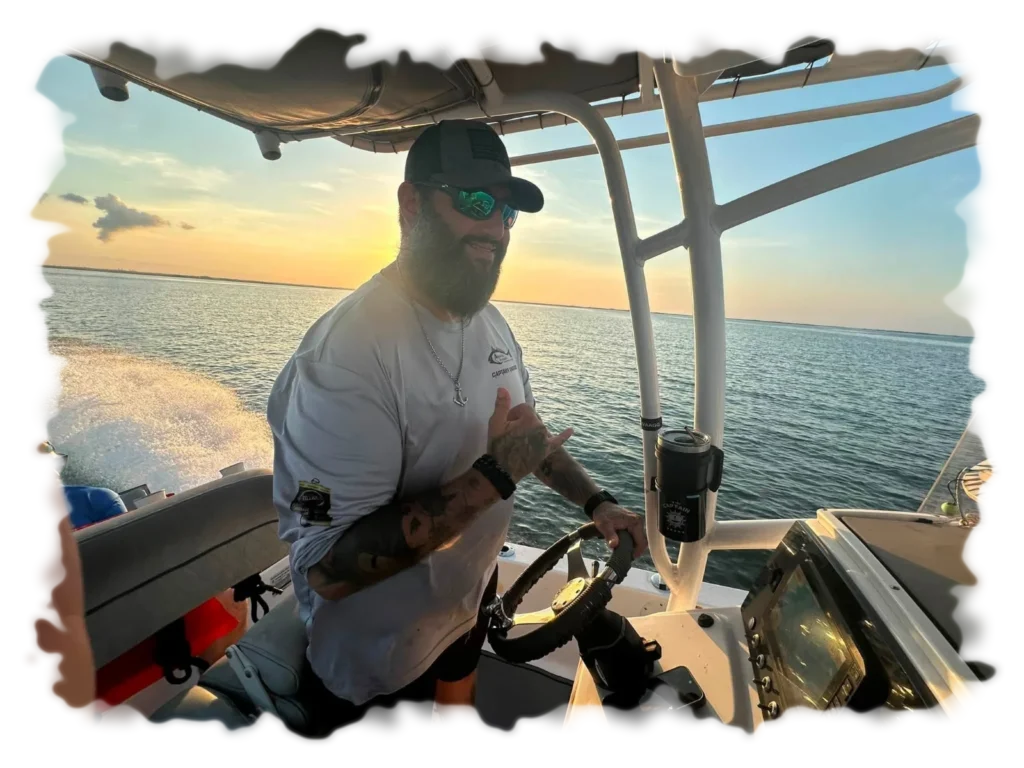 Captain Jarrod at the helm of the Aquatic Escapes boat on Tampa Bay