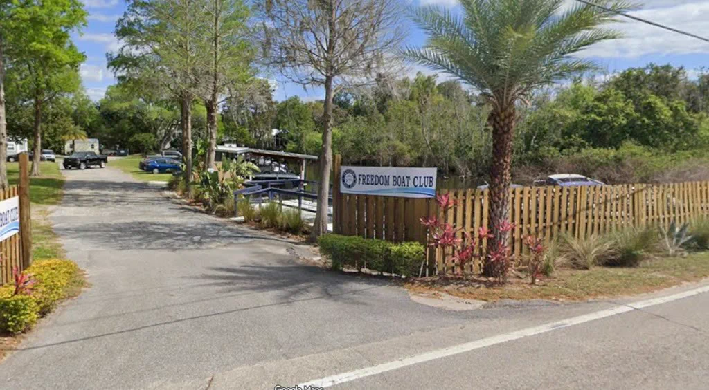 Freedom Boat Club entrance and covered boat docks on Lake Eloise Drive in Winter Haven
