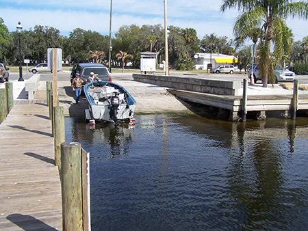 A boat launching at the Riverside Park ramp beside the courtesy dock on the Manatee River in Palmetto