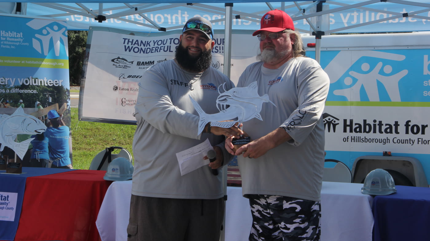 Captain Jarrod awarding the catfish trophy at the 2020 Veterans Inshore Slam