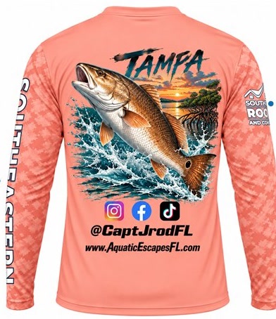 Back of a coral custom fishing shirt with redfish artwork