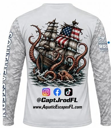 Back of a light gray custom fishing shirt with kraken ship artwork